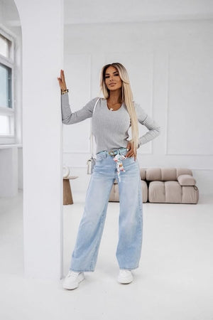 High-Waisted Jeans With Heart-Shaped Distressing