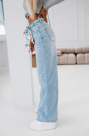 High-Waisted Jeans With Heart-Shaped Distressing
